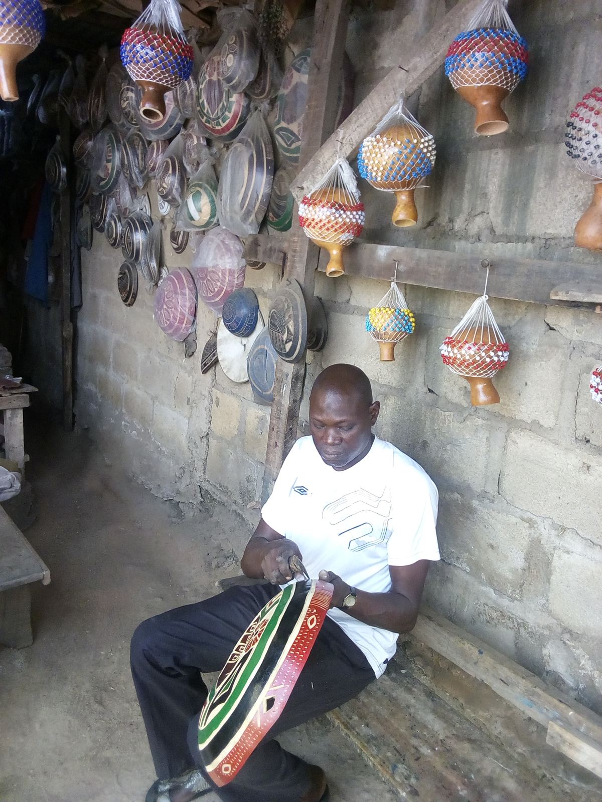 Calabash carver at work
